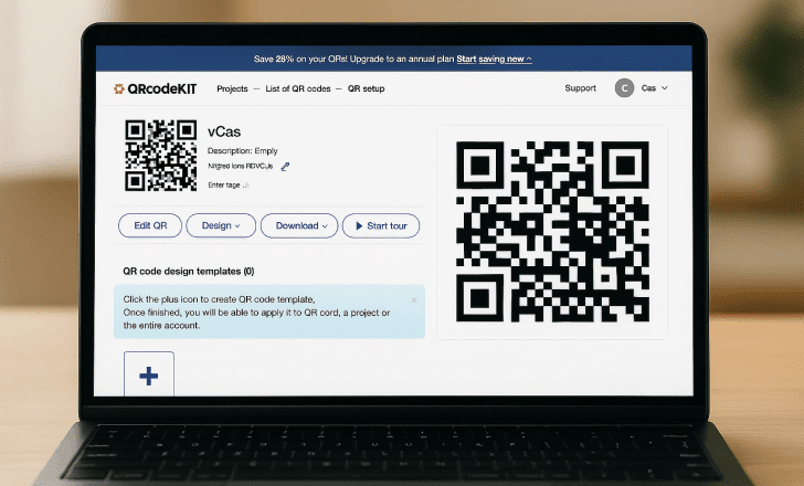Laptop displaying the QRcodeKIT dashboard with design template options and dynamic QR code settings.